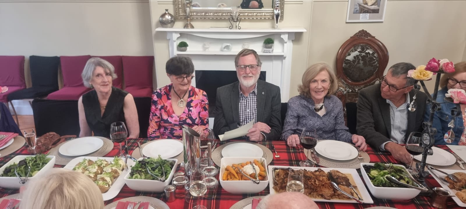 A group of people who are enjoying food at an event at The Convent at Koroit.