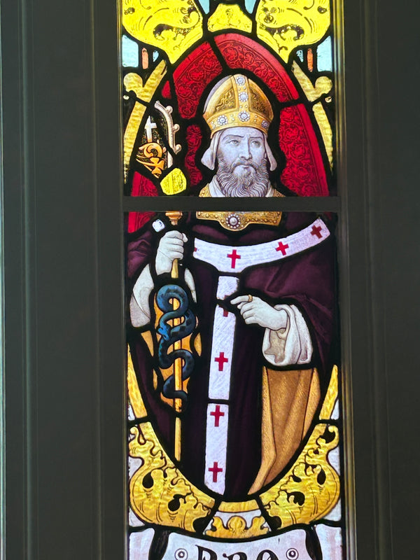 Up close photo of the stain glass window located on the stairs of the convent at Koroit.