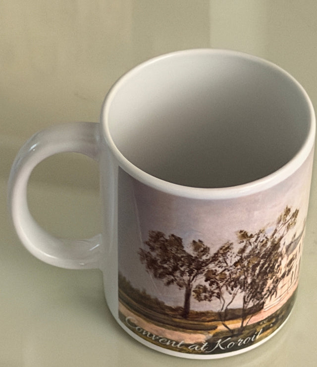 A mug with a picture of the Convent at Koroit on it by a local artist.