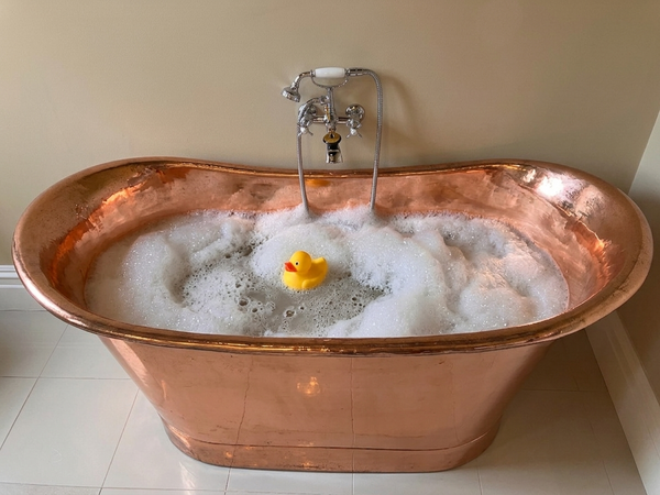Experience ultimate relaxation in our luxurious copper bath, a centerpiece of comfort at the Convent at Koroit. Handcrafted with a timeless design, this deep, spacious tub offers a soothing retreat. Enjoy the perfect blend of elegance and tranquility as you unwind in the warm embrace of our copper bath.