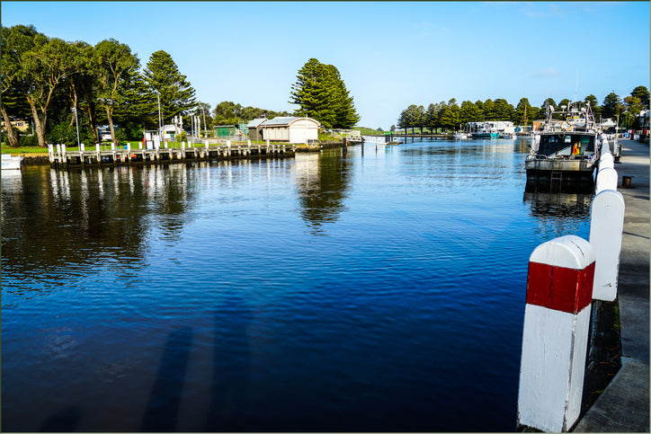 Photo of the Moyne river in Port fairy with boats mored along the edges. Located just 15 minutes from the Convent at Koroit.