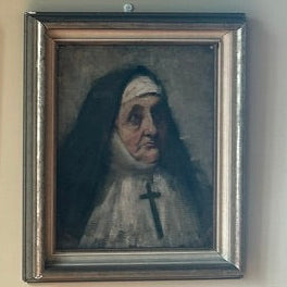"19th-century German oil painting of a nun, by an unknown artist, showing a solemn figure who likely endured suffering but gazes upward with hope. The painting conveys a sense of resilience and faith, capturing the nun's inner strength and devotion."