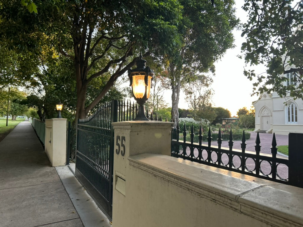 View of the front gate of The Convent at Koroit looking down Anzac ave towards tower hill